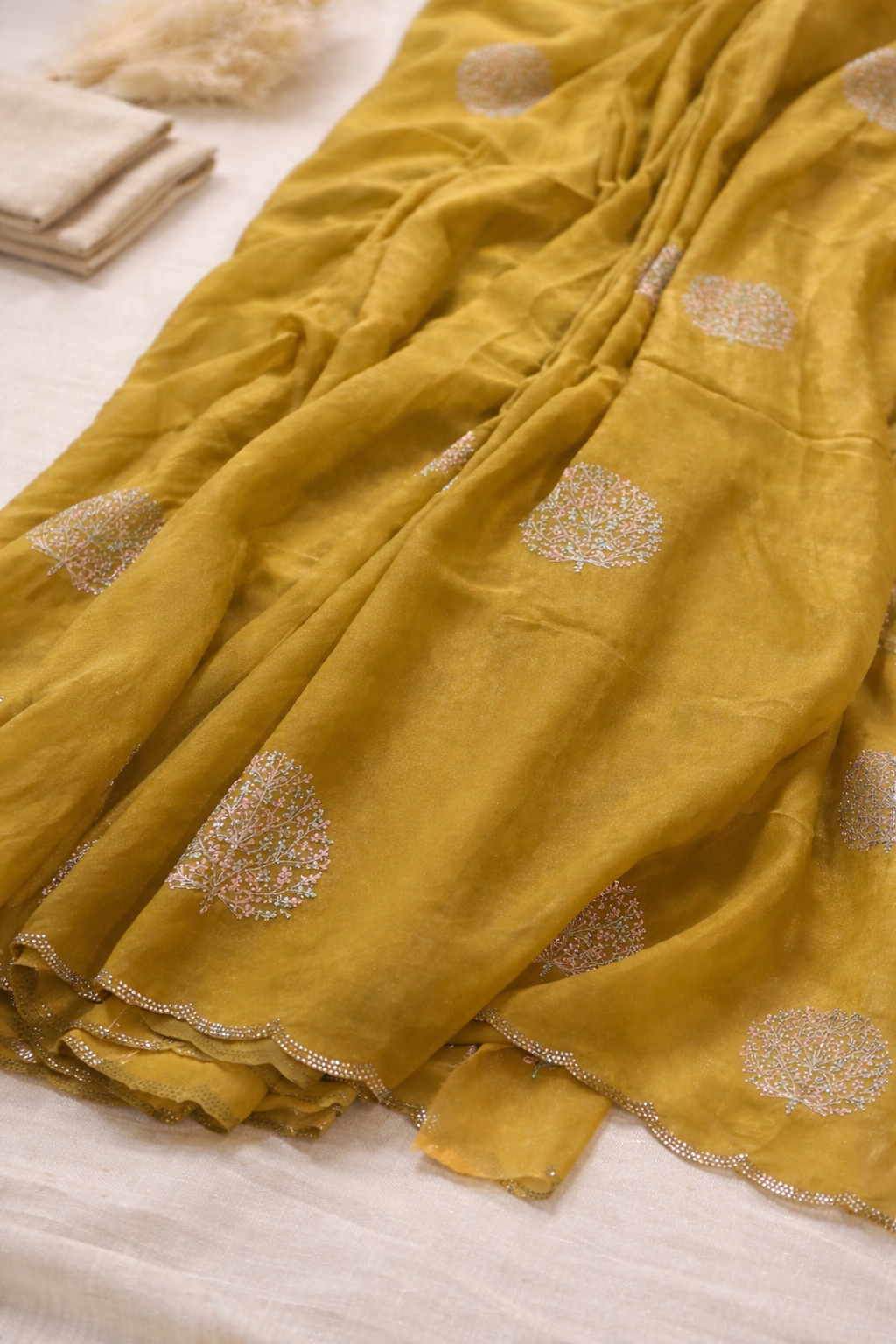 Mustard Yellow Fancy Saree with Pastel Embroidery and Gold Bead Border